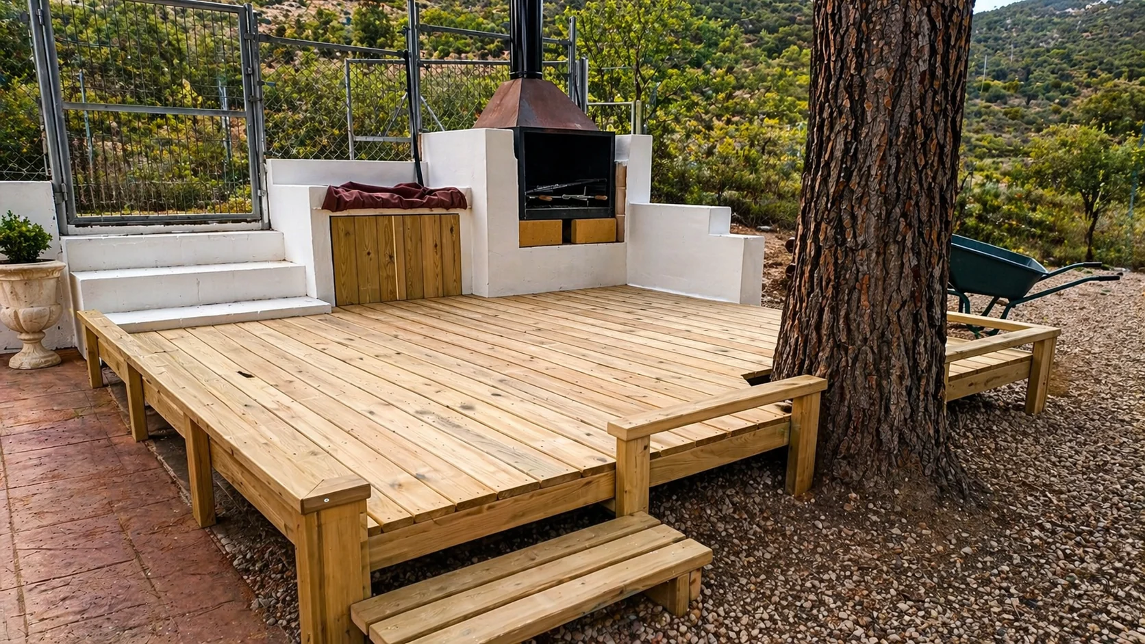 Ilustración de cocina exterior junto a una terraza de madera